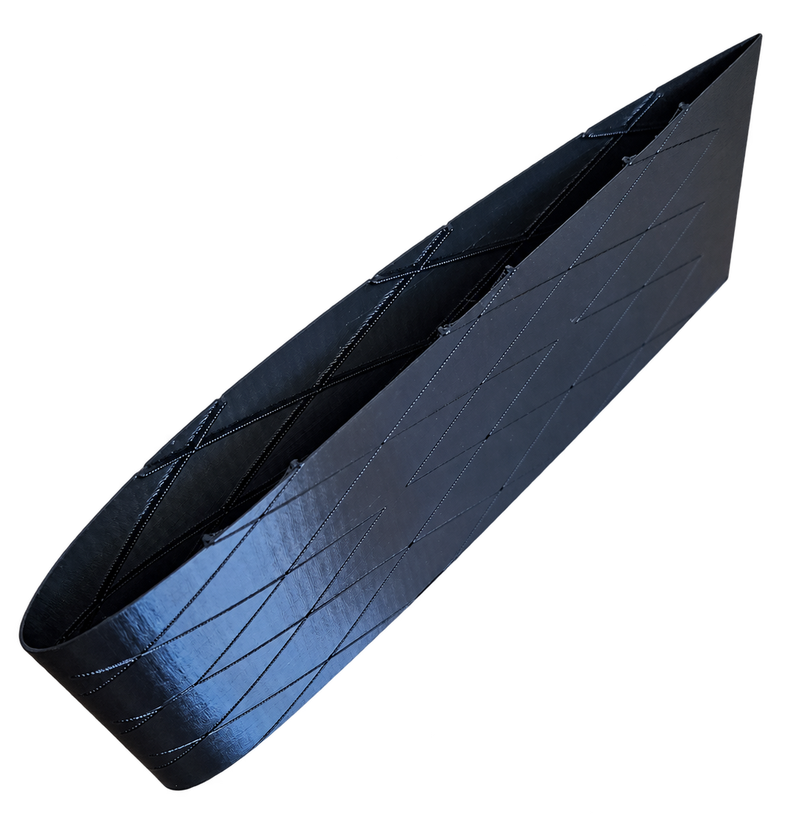 Earlier black printed wing section with an open end and a simpler diagonal internal pattern.